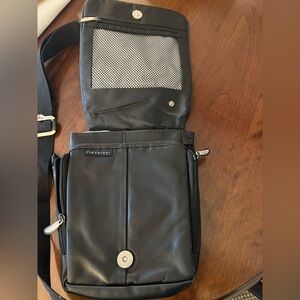 Travelon Anti-Theft Crossbody Sling Bag made from Black Leather.